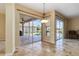 Covered patio with access to the pool and interior living spaces at 1348 Reserve Dr, Venice, FL 34285