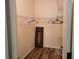 Spacious walk-in closet features ample storage with shelving and hanging space at 201 Auburn Woods Cir, Venice, FL 34292