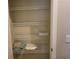 Linen closet with wire shelving perfect for storage and organization at 201 Auburn Woods Cir, Venice, FL 34292