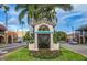 Welcome sign to Historic Venice surrounded by lush landscaping and charming architecture at 201 Auburn Woods Cir, Venice, FL 34292