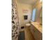 Cozy bathroom featuring a vanity, toilet, and shower with curtain at 356 Longwood Dr, Venice, FL 34285
