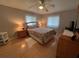 Bedroom featuring laminate wood floors, neutral wall color and bright, natural light at 356 Longwood Dr, Venice, FL 34285