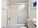 The bathroom has a shower and tub combination with a vanity next to it at 654 Bird Bay E Dr # 206, Venice, FL 34285