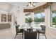 Kitchen nook overlooking pool with seating for four and bright natural light at 1206 Tuscany Blvd, Venice, FL 34292