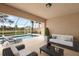 Screened patio featuring a pool with lounge chairs and an outdoor seating area for relaxing at 13364 Dimarco St, Venice, FL 34293