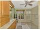 Beautiful bathroom with walk-in shower and granite countertops at 1815 Killdeer Ct, Venice, FL 34293