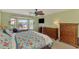 Bright main bedroom with pool view at 1815 Killdeer Ct, Venice, FL 34293