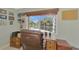 Office features a desk with a view of the pool at 1815 Killdeer Ct, Venice, FL 34293