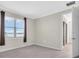 Bedroom with plush carpet, large bright window and view of the water at 232 Teramo Way, Nokomis, FL 34275
