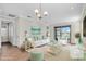Bright living room with modern furniture and decor at 232 Teramo Way, Nokomis, FL 34275