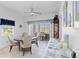 Bright dining room with patio access and stylish decor at 5800 Sabal Trace Dr # 501, North Port, FL 34287