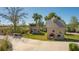 Community play area featuring two small wooden playhouses, adding charm and fun at 8545 Daybreak St, Sarasota, FL 34241