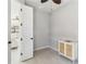 Bedroom with a ceiling fan, cabinet, and a doorway leading to another room at 13864 Posada St, Venice, FL 34293
