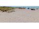 Expansive beach with soft sand perfect for sunbathing, relaxation, and enjoying the ocean breeze at 1423 Avenida Del Circo # 1C, Venice, FL 34285