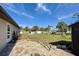 Spacious backyard with a stone patio, perfect for outdoor entertaining at 3187 Galiot Rd, Venice, FL 34293