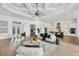 Expansive living room showcases an open concept layout, connecting seamlessly with the kitchen and dining area at 400 Maraviya Blvd, Nokomis, FL 34275