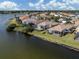 Waterfront homes feature screened lanais and some have swimming pools at 651 Lakescene Dr, Venice, FL 34293
