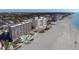 Expansive beachside condos featuring pools, lush landscaping, and easy access to the pristine beach and the city beyond at 840 The Esplanade N # 104, Venice, FL 34285