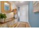 Inviting home entryway with console table, decorative mirror, and stylish accents creating a warm welcome at 840 The Esplanade N # 104, Venice, FL 34285