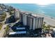 Modern beachfront condo with parking and ocean views, a prime location, and a pathway to relaxing beach days at 840 The Esplanade N # 104, Venice, FL 34285