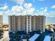 Stunning beachfront condo building with ample parking, offering breathtaking ocean views and resort-style living at 840 The Esplanade N # 104, Venice, FL 34285