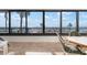 Enjoy gulf views from this lanai, complete with tile flooring, seating, and access to the outdoors at 840 The Esplanade N # 104, Venice, FL 34285