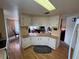 Efficient kitchen with ample counter space, updated cabinets and views to the dining and living room at 863 Baveno Dr, Venice, FL 34285