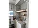 Functional laundry room with essential appliances at 863 Baveno Dr, Venice, FL 34285