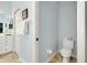 Cozy bathroom features updated fixtures and a neutral color palette at 107 Corte Del Rosa, Venice, FL 34285