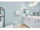 This bathroom features a single sink vanity and plenty of storage space at 107 Corte Del Rosa, Venice, FL 34285