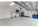 Spacious and organized garage with ample storage and epoxy flooring at 11053 Barnsley Dr, Venice, FL 34293
