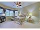Bright bedroom with large windows and comfortable furnishings at 1655 Lancashire Dr # 1655, Venice, FL 34293