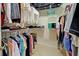 Walk-in closet features ample storage at 1655 Lancashire Dr # 1655, Venice, FL 34293