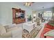 Spacious living room with cozy seating and open layout at 1655 Lancashire Dr # 1655, Venice, FL 34293
