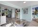 Cozy living room with coastal accents, wood-look flooring, and an open layout at 1985 Fairview Dr, Englewood, FL 34223