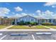 Charming building exterior with well-maintained landscaping and parking at 3300 Loveland Blvd # 1504, Punta Gorda, FL 33980