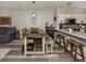 Open concept living space featuring a dining area, kitchen and living room with coordinated decor and design at 335 Englewood Isles Pkwy # 55, Englewood, FL 34223