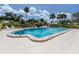 Community pool offers a refreshing escape in a tropical setting at 335 Englewood Isles Pkwy # 55, Englewood, FL 34223