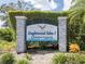 Entrance sign to Englewood Isles, a waterfront community at 335 Englewood Isles Pkwy # 55, Englewood, FL 34223