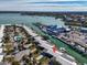 Stunning aerial view of waterfront homes with boat docks and canal access at 833 White Cap Cir # 8, Venice, FL 34285