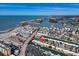 Coastal community aerial view; homes with canals leading to the ocean at 833 White Cap Cir # 8, Venice, FL 34285