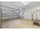 Spacious two-car garage with overhead door and plenty of room for storage and parking at 900 Paisley Ct # 1, Venice, FL 34293