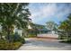 Community space featuring lush landscaping, seating, and architectural harmony in Wellen Park at 11571 Gleaming Ter, Venice, FL 34293