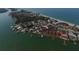 Scenic aerial view showcases waterfront homes and condos, with boat docks and ocean access at 2737 Cottage Ln, North Port, FL 34286