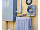 Exterior view of utility features, including a generator outlet and electrical panel on the side of the house at 2737 Cottage Ln, North Port, FL 34286