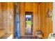 Wood paneled sauna featuring a shower and view to the backyard at 2737 Cottage Ln, North Port, FL 34286