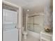 Bathroom including shower, washing machine, dryer and toilet at 627 Alhambra Rd # 601, Venice, FL 34285