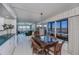 Open dining and living area concept with great views from the windows at 627 Alhambra Rd # 601, Venice, FL 34285