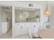 Bright, white kitchen overlooking the dining and living areas at 627 Alhambra Rd # 601, Venice, FL 34285
