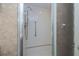 Bright shower with tiled walls and modern fixtures at 627 Alhambra Rd # 601, Venice, FL 34285